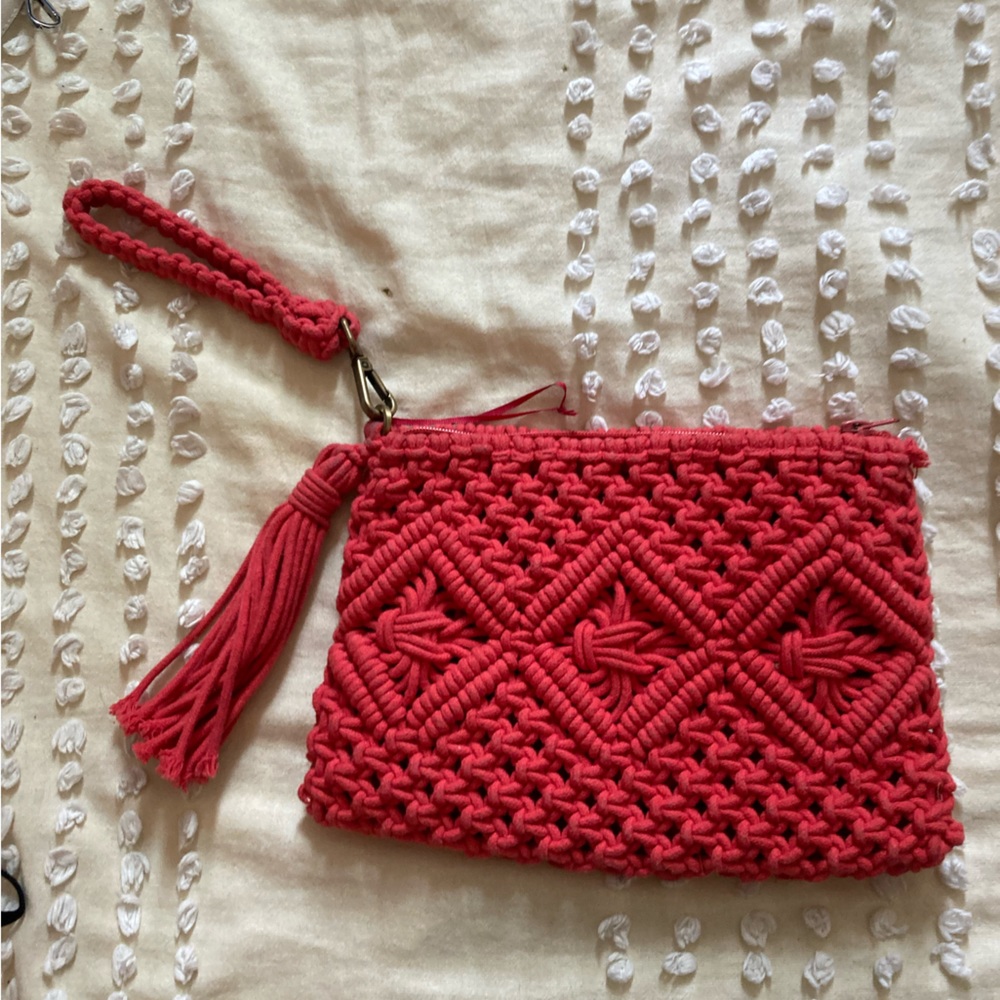 Knitted red clutch
